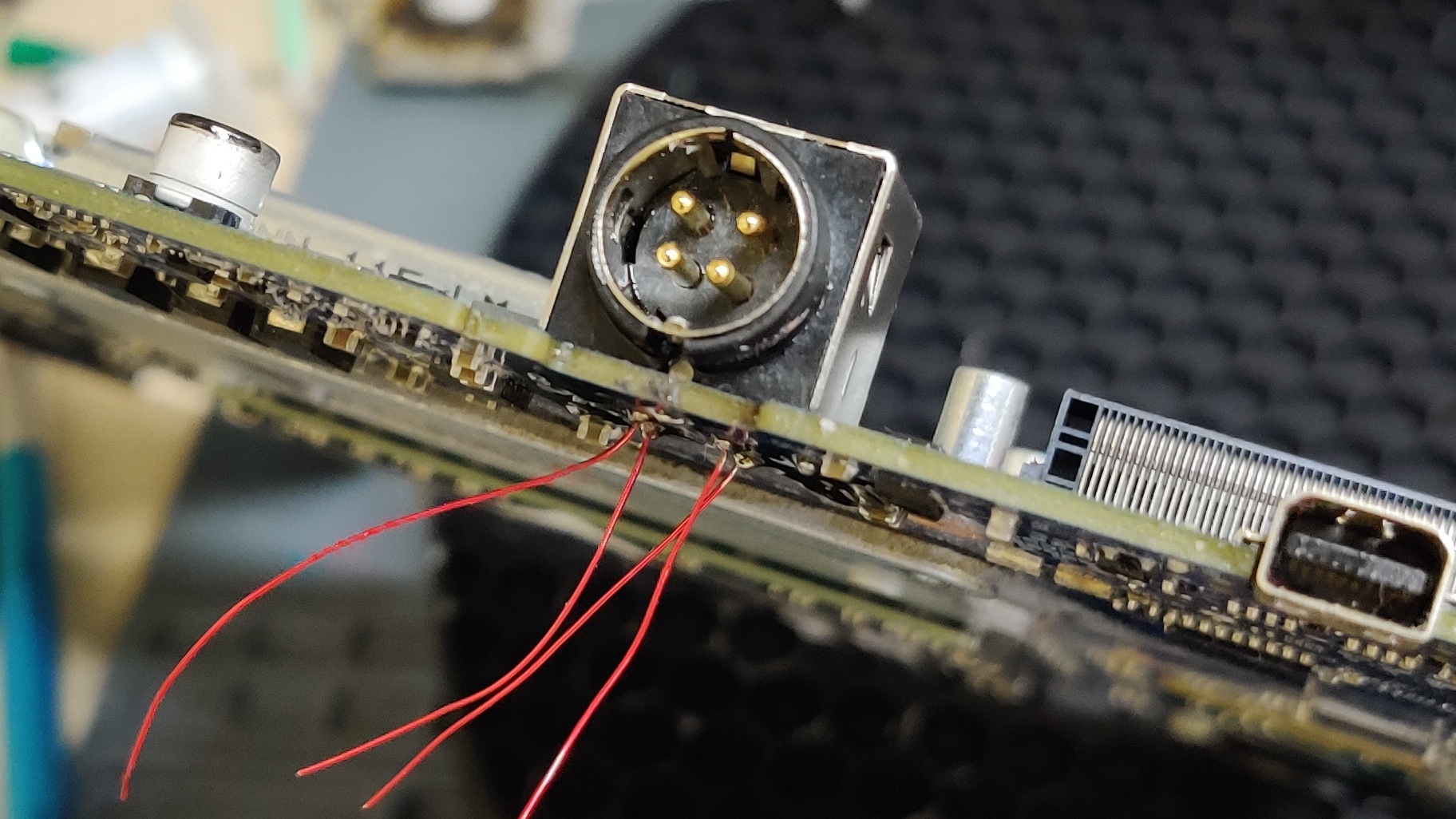 through the hole and anchored Image